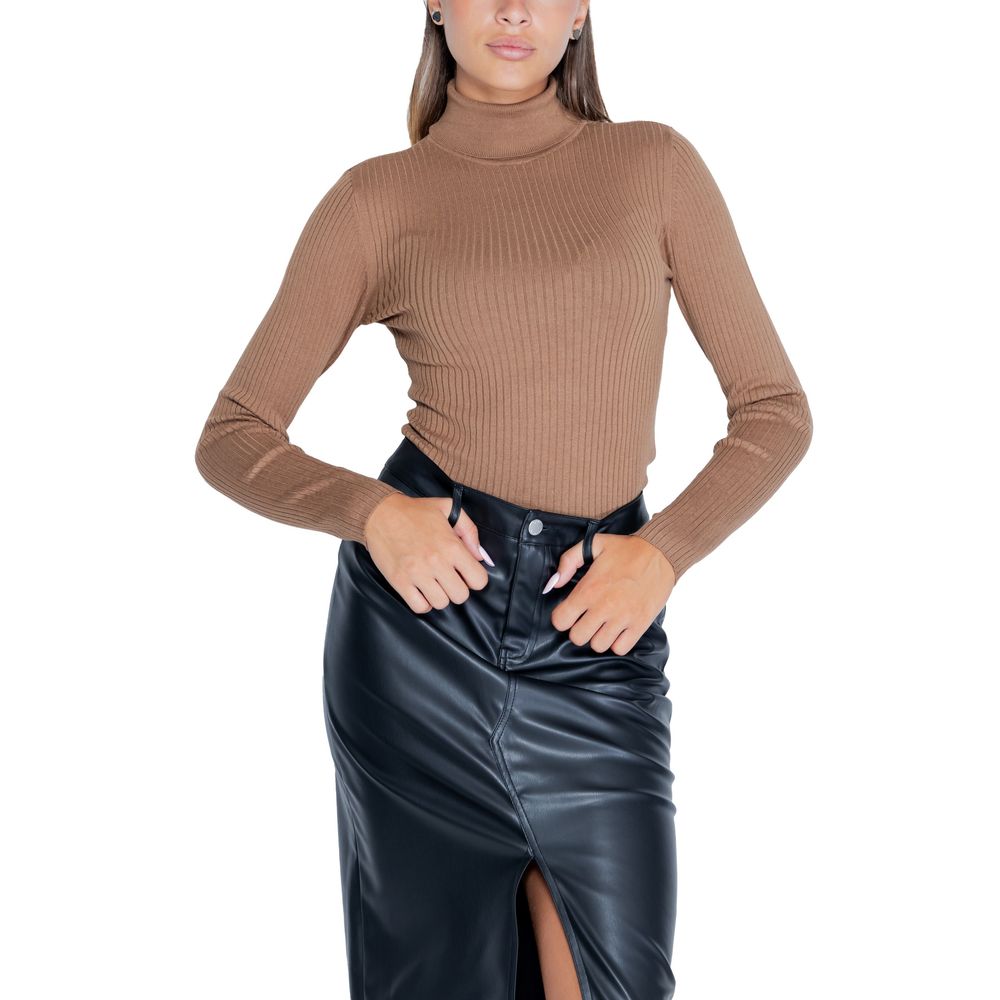 Woman wearing Jacqueline De Yong Brown Viscose Sweatshirt with roll neck and long sleeves, paired with a black faux leather skirt.