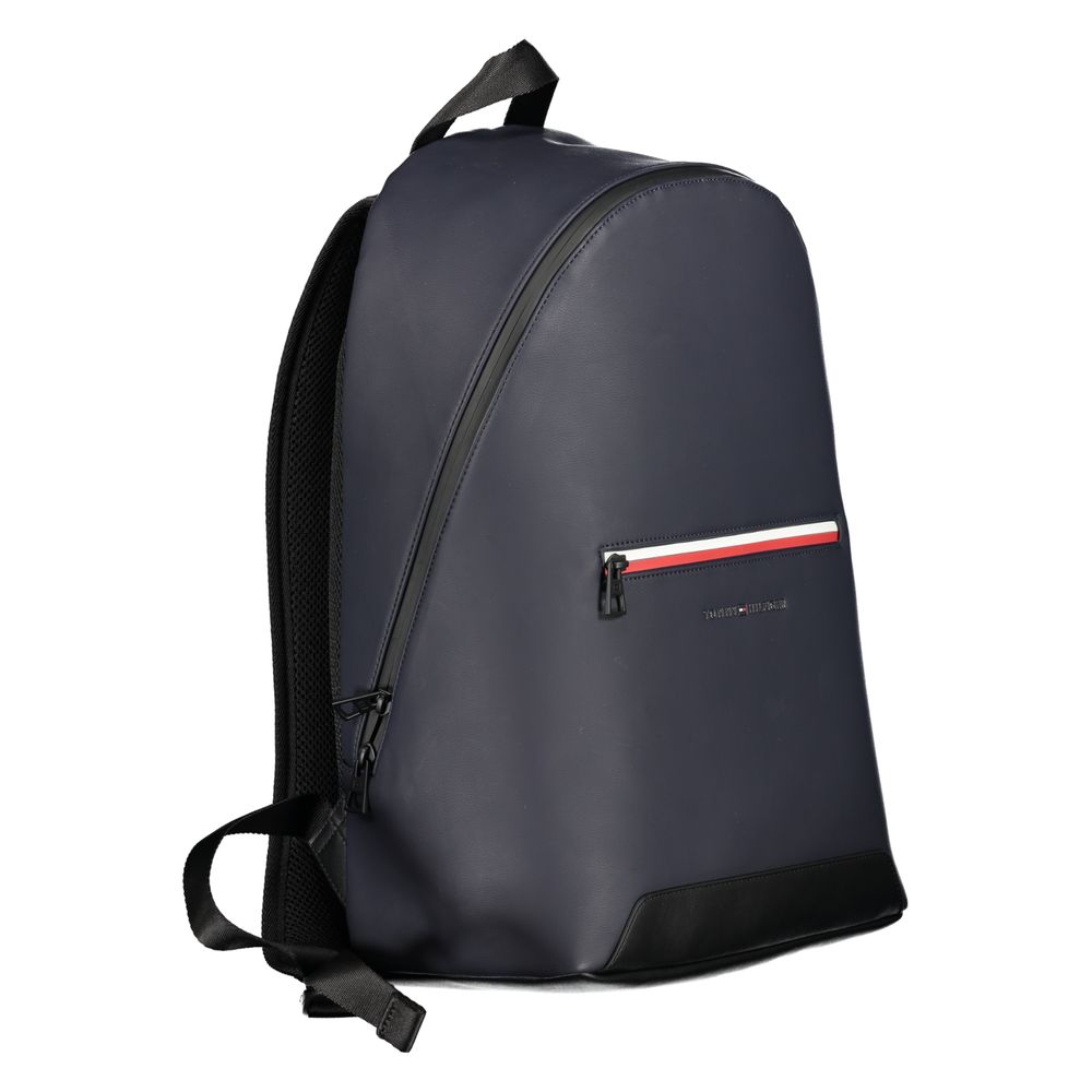Tommy Hilfiger Blue Polyester Backpack with adjustable straps, zip closure, and logo. Features external pocket and internal document storage.