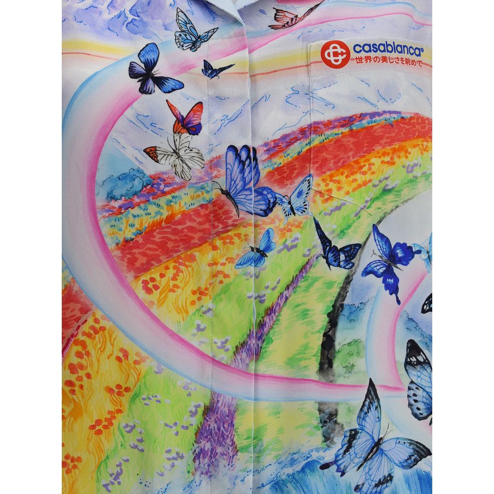 Casablanca Multicolor Silk Pattern Shirt with landscape and butterfly print, light blue, short sleeves, open collar, oversized fit.