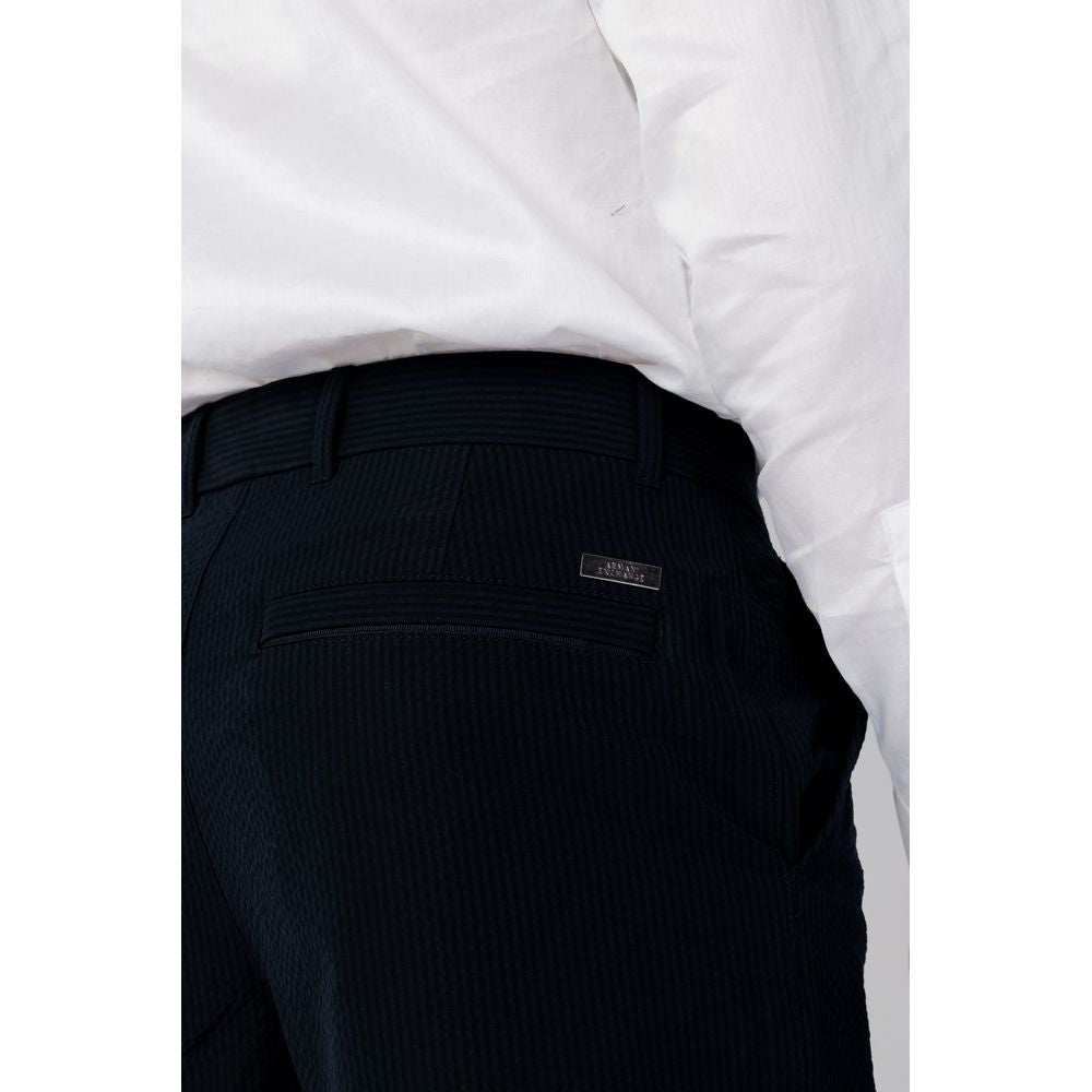 Close-up of Armani Exchange Blue Cotton Casual Pants, showcasing the minimalist design and back welt pocket.