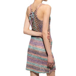 Back view of woman wearing Chloé Crochet Mini Dress with drawcords and decorative round gold-tone applications.