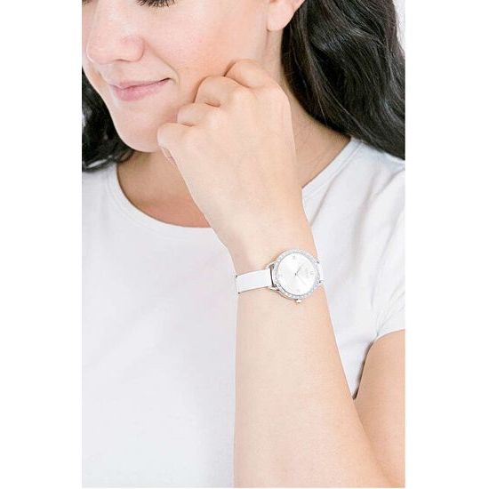 Lady wearing a watch with a white strap