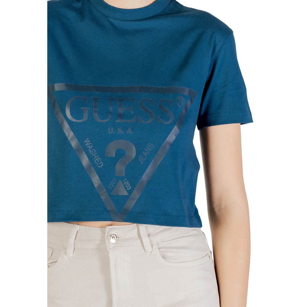 Model wearing ADELE CROP short sleeve t-shirt by Guess Active, showcasing the Guess logo. Perfect summer Guess Active Black Cotton Sportswear.