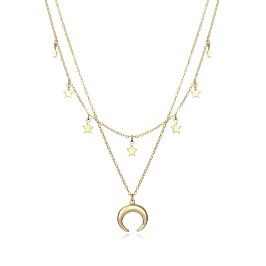 Elegant gold layered necklace with star charms and crescent moon pendant, stylish design for fashion-forward individuals.