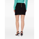 Balmain High-waisted bouclé miniskirt