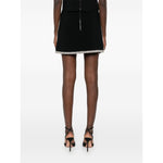 Alice + Olivia Skirts Black