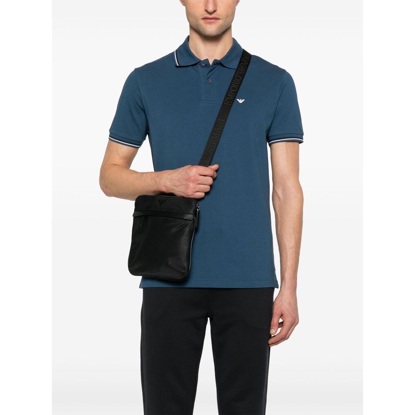 Front view with bag zipped and handles upright.