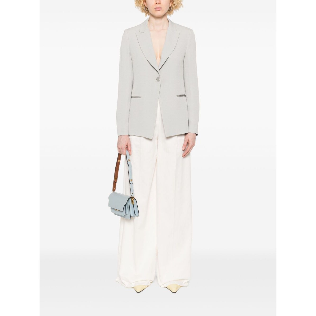 Front view with bag zipped and handles upright.