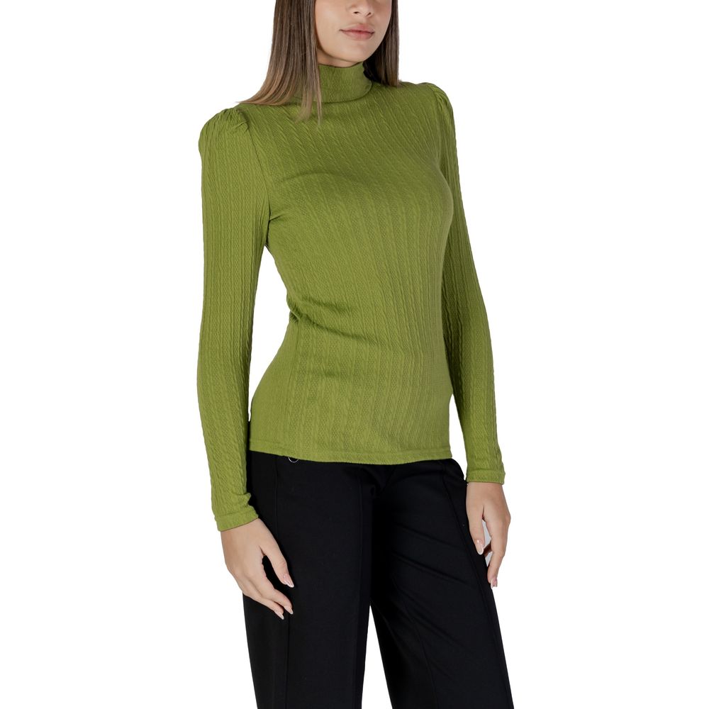Woman wearing a B.Young Green Polyester Long Sleeve T-Shirt with high neck and ribbed texture, showcasing elegance and style.