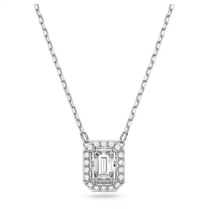 Elegant silver chain necklace with a rectangular crystal pendant.