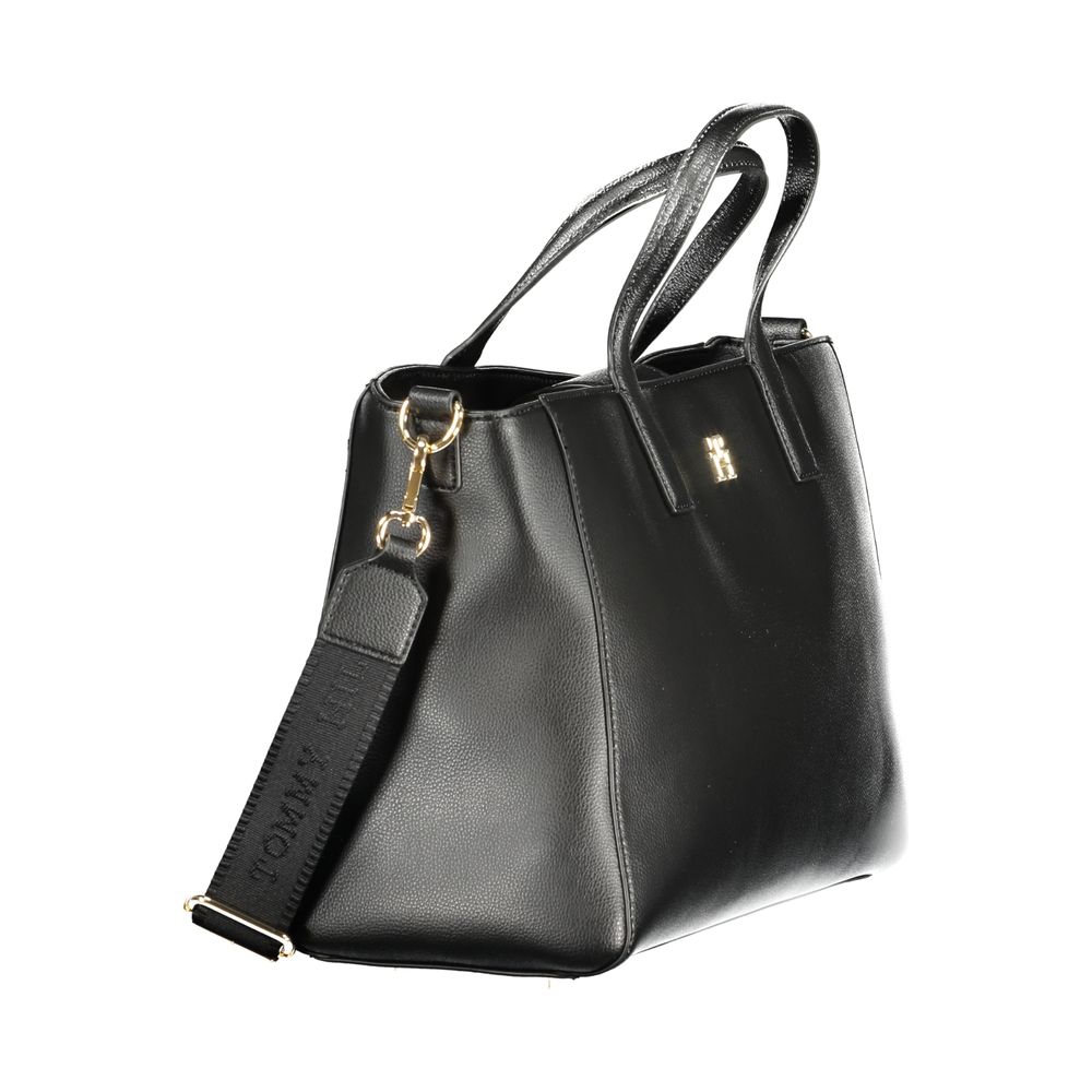 Front view with bag zipped and handles upright.