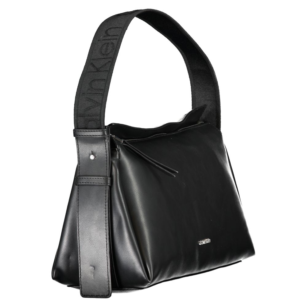 Calvin Klein Black Polyester Handbag with adjustable shoulder handle and recycled material, featuring contrasting details and zip closure.