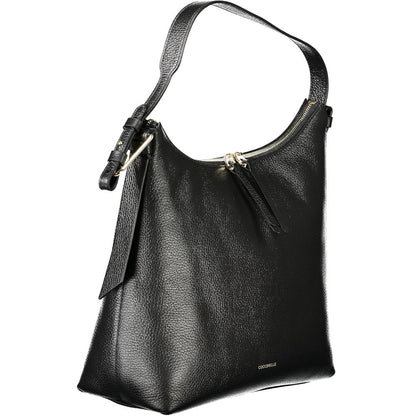 Coccinelle Black Leather Women Handbag with adjustable shoulder strap, featuring a zip closure and sleek Italian design for elegant essentials.
