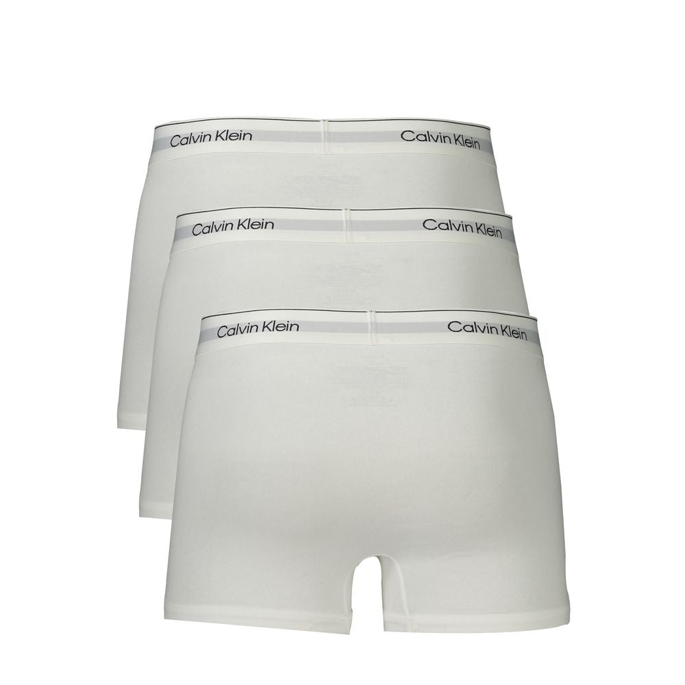 Calvin Klein White Cotton Men Boxer tri-pack with elastic waistband and logo, offers unmatched comfort and style for modern men.