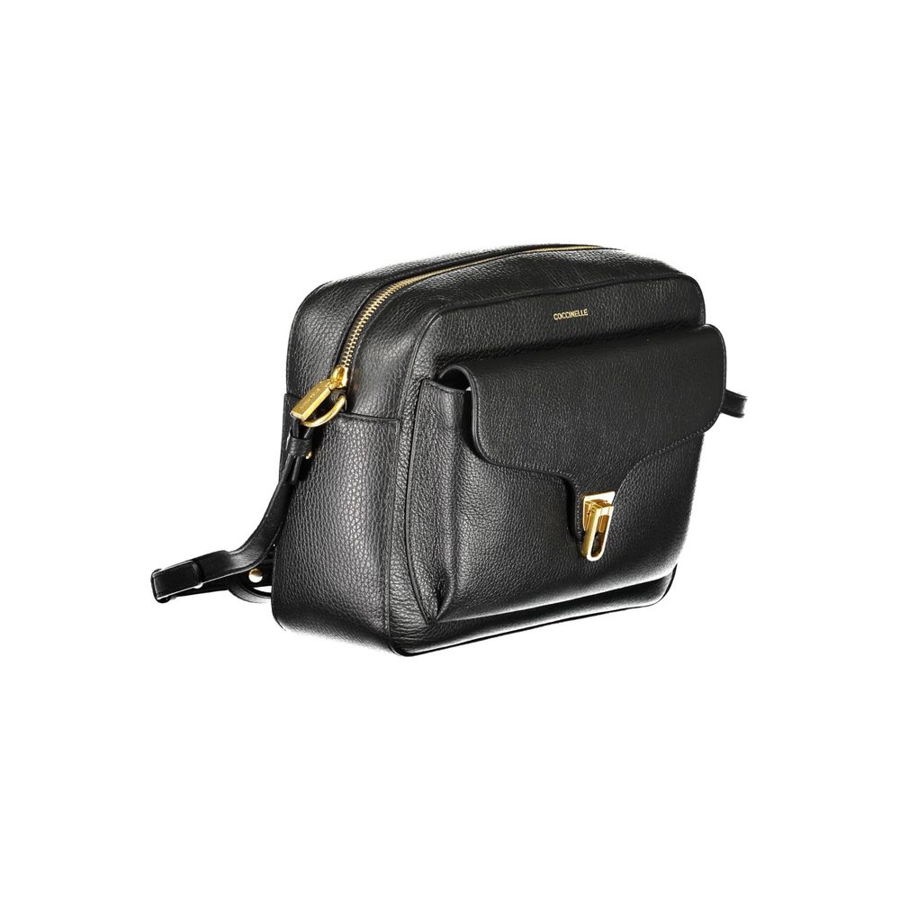 Coccinelle Black Leather Women Handbag with adjustable strap, gold hardware, and zipper closure, perfect for everyday elegance.