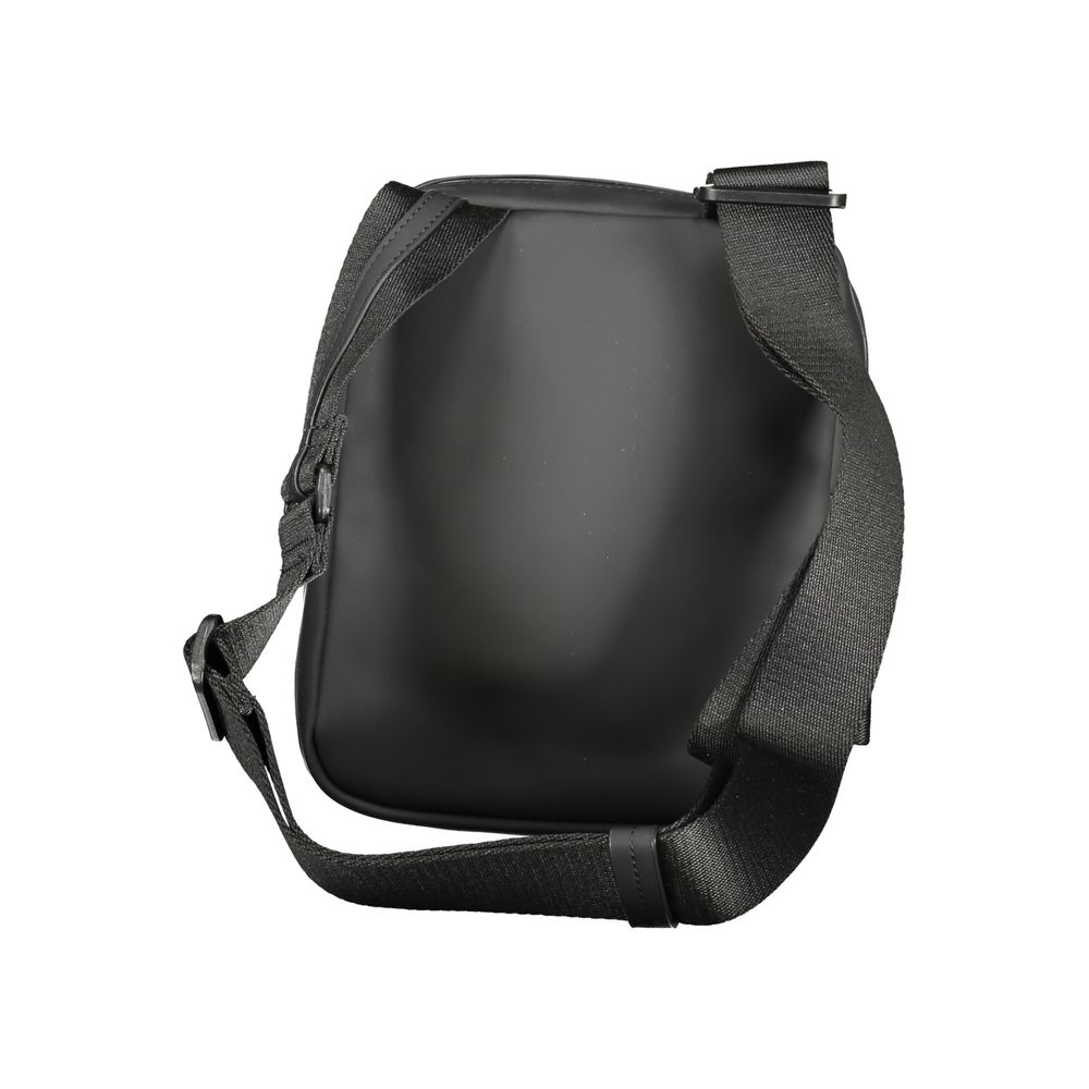 Calvin Klein Black Polyester Men Shoulder Bag, featuring adjustable strap and zip closure for modern style and functionality.