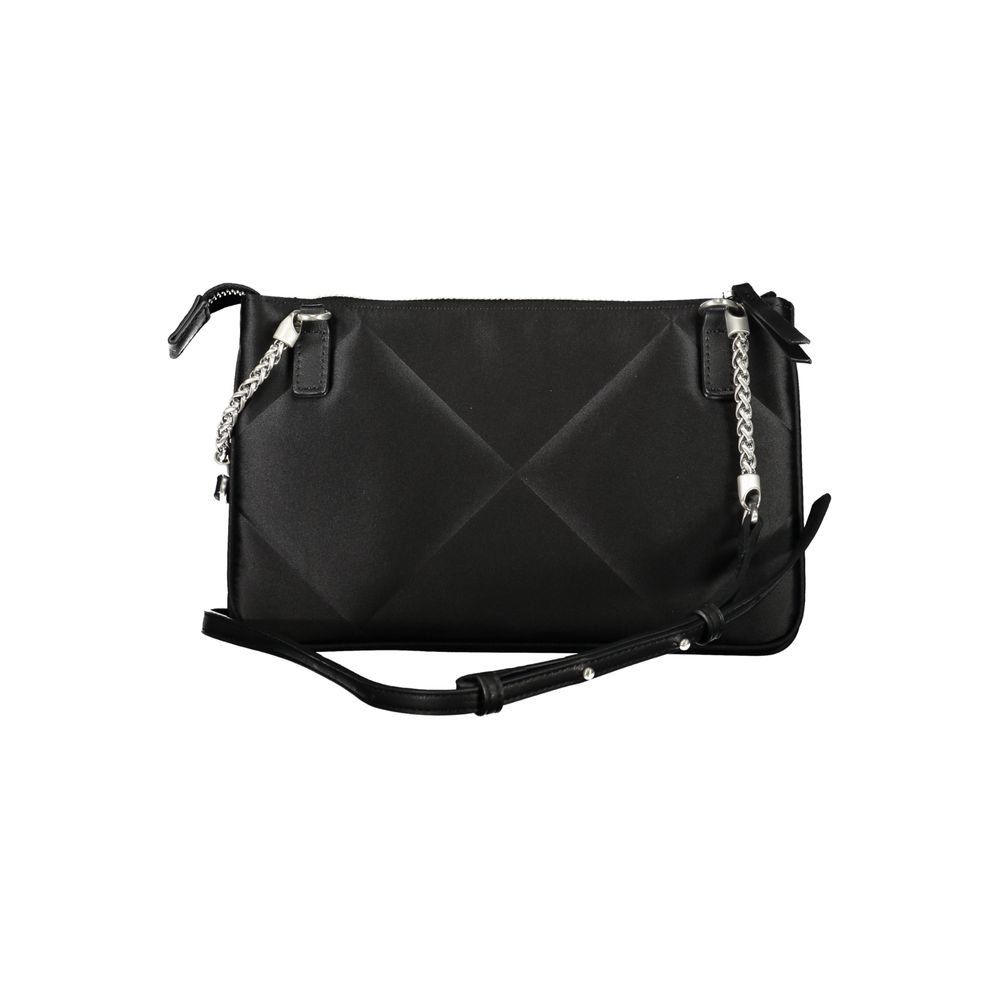 Calvin Klein Black Polyester Handbag with adjustable shoulder strap, zip closure, and logo detailing. Stylish and eco-friendly accessory.