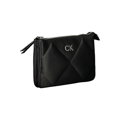 Calvin Klein Black Polyester Handbag with adjustable shoulder strap, 2 compartments, card pocket, zip closure, and CK logo.