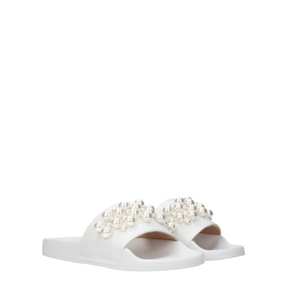 Stuart Weitzman White Leather Slippers with pearl detail, open toe, and rubber sole, perfect for street style.
