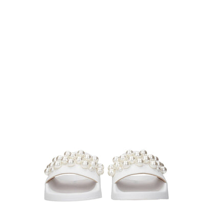 Stuart Weitzman White Leather Slippers with pearl details, open toe, low flat heel, and rubber sole, stylish streetwear footwear