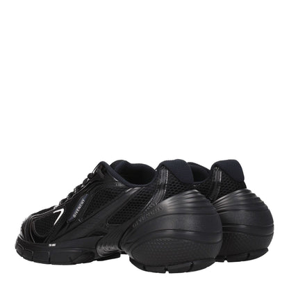 Givenchy Black Fabric Athletic Sneakers with logos, lace-up, rubber sole, and mid heel, style code F76586, back view angle.