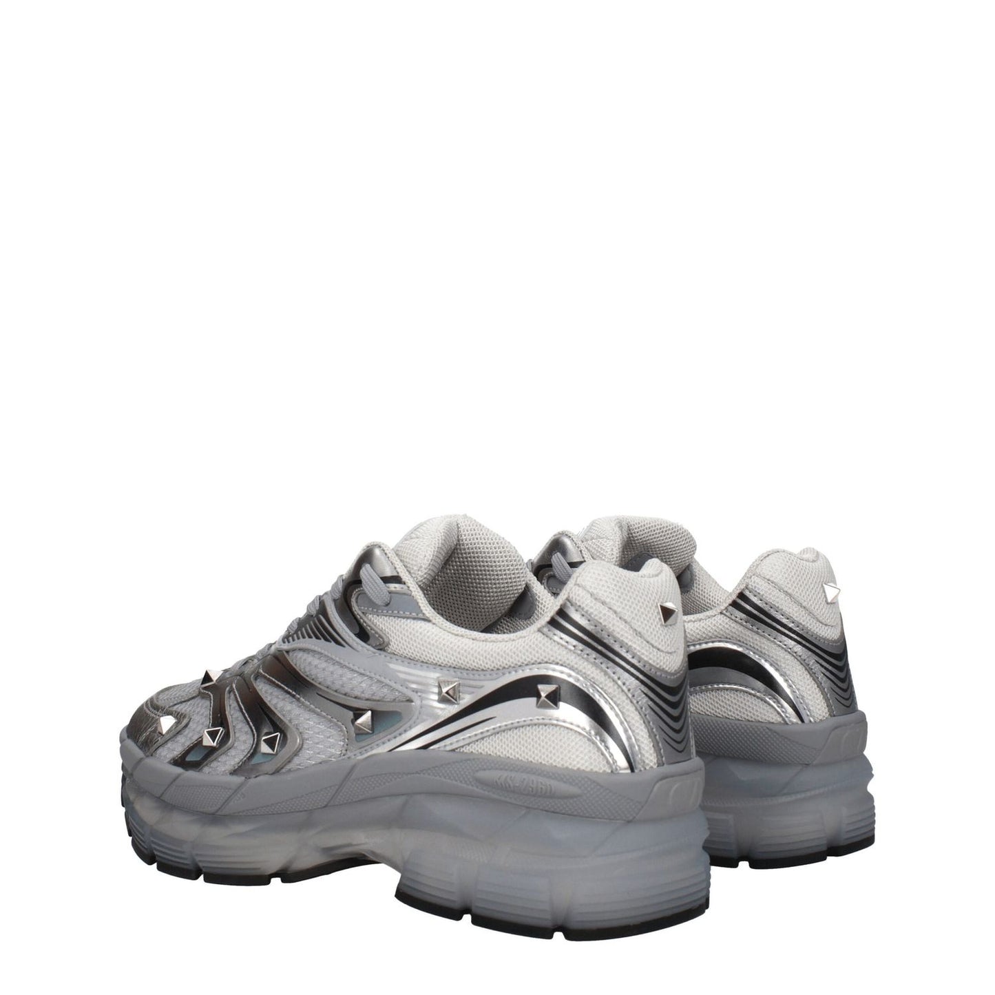 Valentino Garavani Gray Fabric Athletic Sneakers with studs and silver accents, featuring lace-up closure and rubber sole.