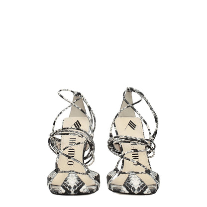 The Attico White Leather Stiletto Heel Sandals with snake print, vintage effect, self-tie closure, and open toe black accents.