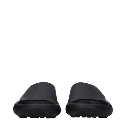 Ambush Black Cotton Slippers featuring side logo, rubber sole, and open toe design. MPN BMIC005MAT0011001, sleek street style footwear.
