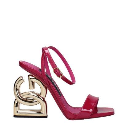 Dolce & Gabbana Pink Leather Stiletto Heel Sandals with gold accents and buckle closure, featuring open toe design and high heel.