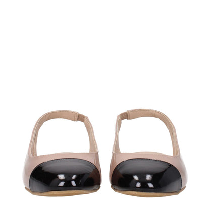 Stuart Weitzman Pink Leather Ballet Flats with black toe detail, patent leather design, low flat heel, and rubber sole.