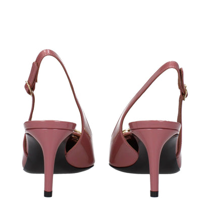 Back view of Dolce & Gabbana Pink Leather High Heel Pumps with pointy toe and mid heels, featuring a buckle closure and leather sole.