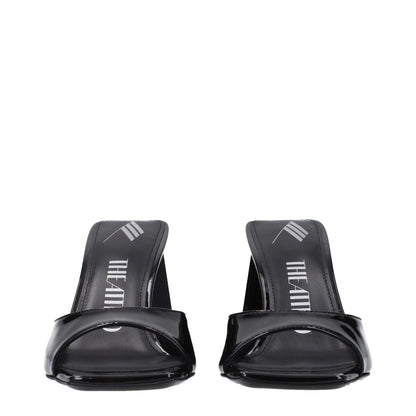 The Attico Black Leather Stiletto Heel Sandals with glossy patent leather, open toe design, mid heels, and leather sole.