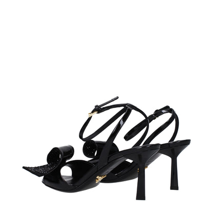 Prada Black Leather Stiletto Heel Sandals with buckle closure, open toe, side detail, and 7.5 cm mid heel, patent leather finish.