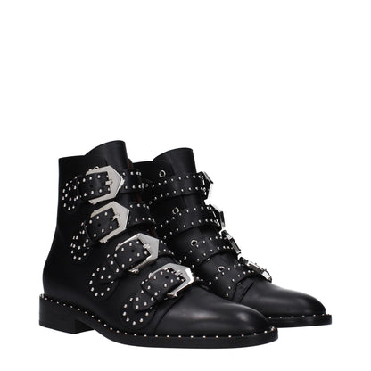 Givenchy Black Leather Ankle Boots with studs and buckle closure, low flat heel, round toe, leather sole.