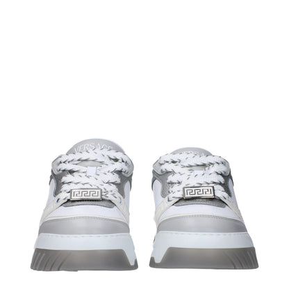 Versace White Leather Chunky Sneakers with lace-up closure, rubber sole, and silver accents, featuring front, side, and back logos.