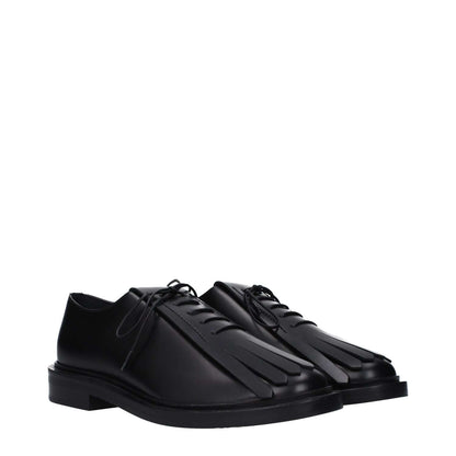 Max Mara Black Leather Oxfords And Derbies with rubber sole, lace-up closure, and round toe design. Casual style with low flat heel.