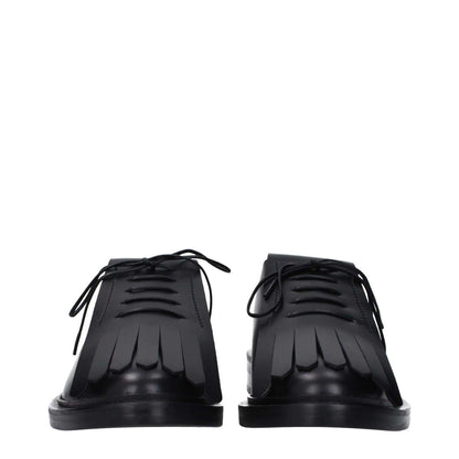 Max Mara Black Leather Oxfords And Derbies with lace up design and fringe detail, featuring rubber sole and low flat heel.