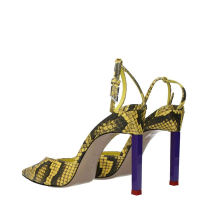 The Attico Yellow Leather Pumps with snake print, high heel, and buckle closure, featuring a pointy toe and leather sole.