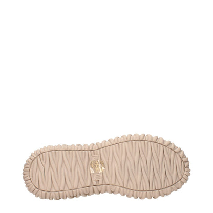 Sole view of Miu Miu Beige Fabric Sneakers showcasing textured beige sole design.