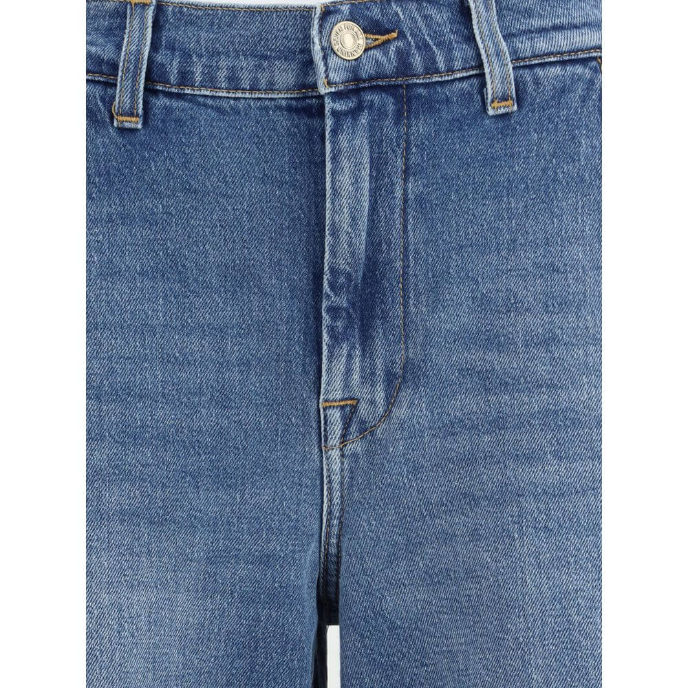 Close-up of 7FOR Light Blue Cotton Relaxed Fit Jeans featuring a zipper and button closure with a wide leg.