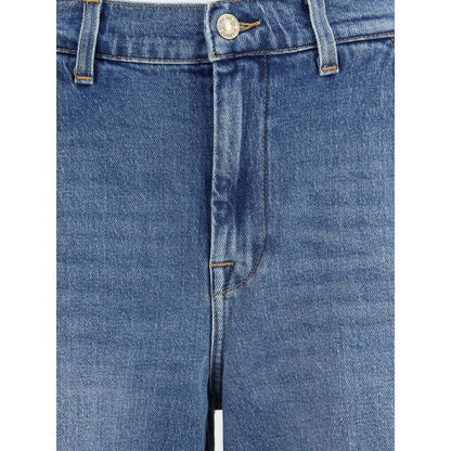 Close-up of 7FOR Light Blue Cotton Relaxed Fit Jeans featuring a zipper and button closure with a wide leg.