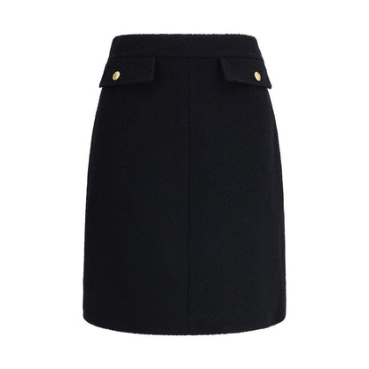 Chloé Black Wool Midi Skirt with front flap pockets and gold-tone buttons, designed for AW25 season.