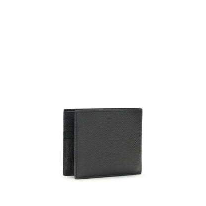 Valentino Garavani Black Calf Leather Bos Taurus Wallet with iconic VLogo, elegant bifold design for stylish organization.