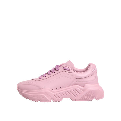 Dolce & Gabbana Pink Leather Daymaster Low Top Sneakers Shoes with rubber sole and lace-up closure on a white background.