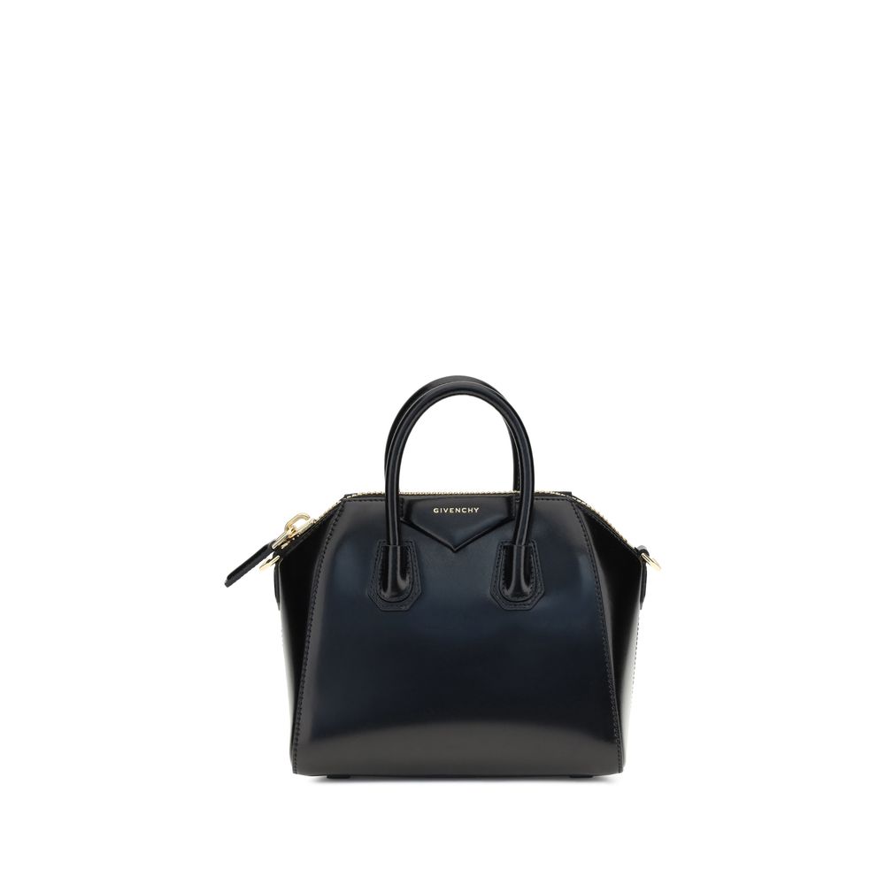 Givenchy Black Calf Leather Bos Taurus Handbag with glossy geometric design, top handles, zipper closure, and monogram on front.
