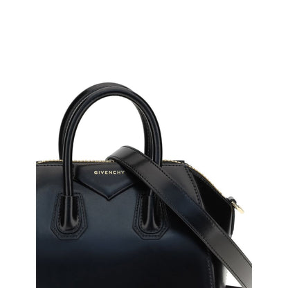 Givenchy Black Calf Leather Bos Taurus Handbag with glossy design and geometric pattern, featuring top handles and iconic brand monogram.