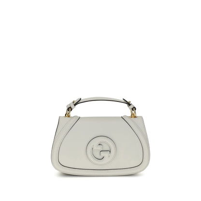 Front view of Gucci White Calf Leather Bos Taurus Handbag with GG applique and adjustable strap.