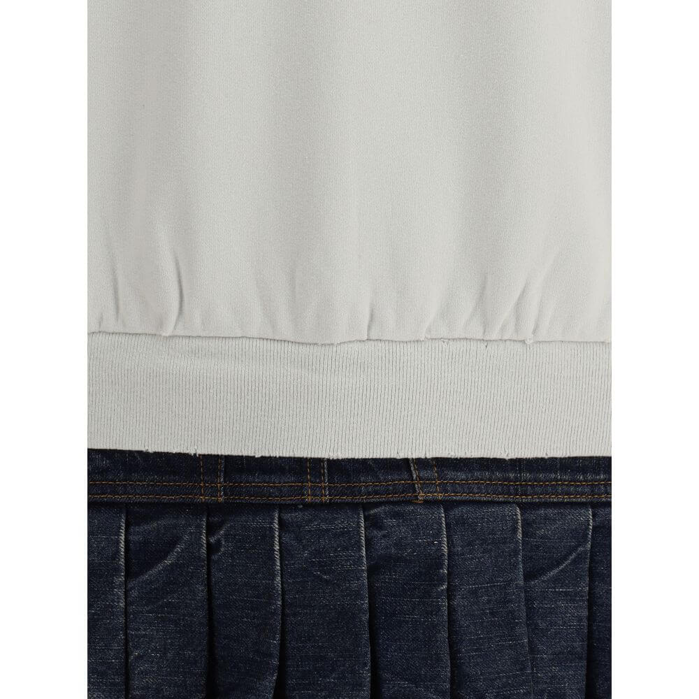 Balenciaga Multicolor Cotton Sweatshirt with ribbed hem and pleated denim skirt.