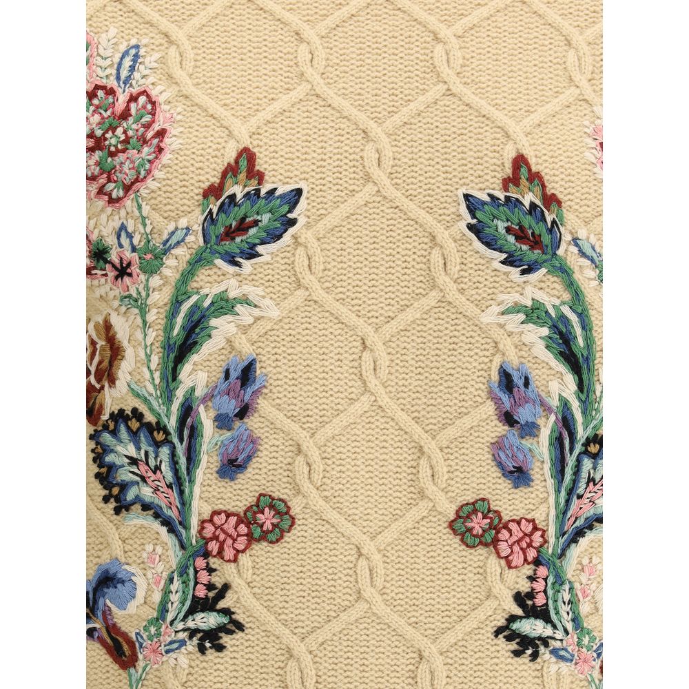 Floral embroidery detail on Etro Beige Wool Sweatshirt, showcasing craftsmanship with ribbed knit design in warm tones.