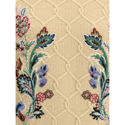 Floral embroidery detail on Etro Beige Wool Sweatshirt, showcasing craftsmanship with ribbed knit design in warm tones.